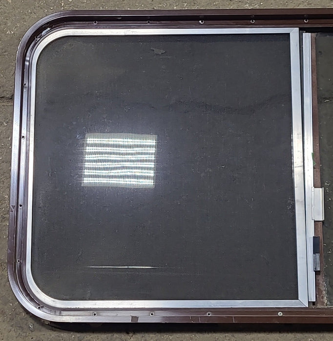 Used Black Radius Opening Window : 42 1/4" W x 21 3/4" H x 1 3/8" D