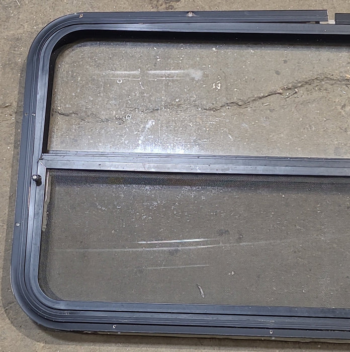 Used Black Radius Opening Window : 42 1/4" W x 22 1/4" H x 1 1/4" D
