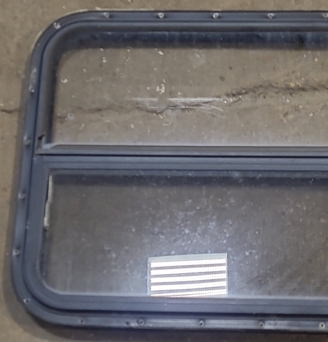 Used Black Radius Opening Window : 42 1/4" W x 22 1/4" H x 1 1/4" D