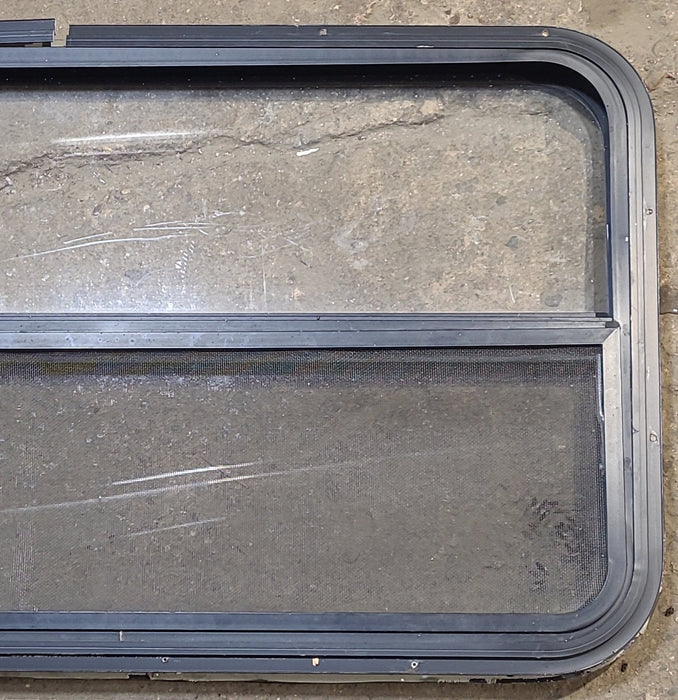 Used Black Radius Opening Window : 42 1/4" W x 22 1/4" H x 1 1/4" D
