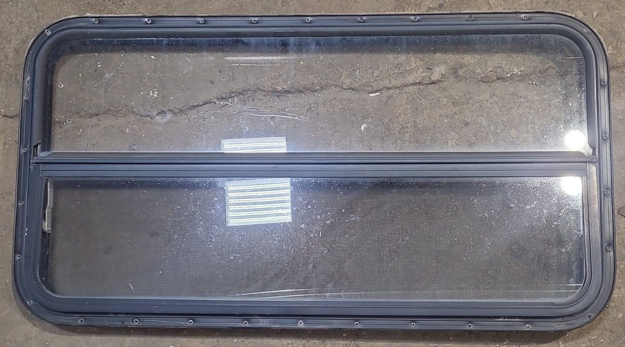 Used Black Radius Opening Window : 42 1/4" W x 22 1/4" H x 1 1/4" D