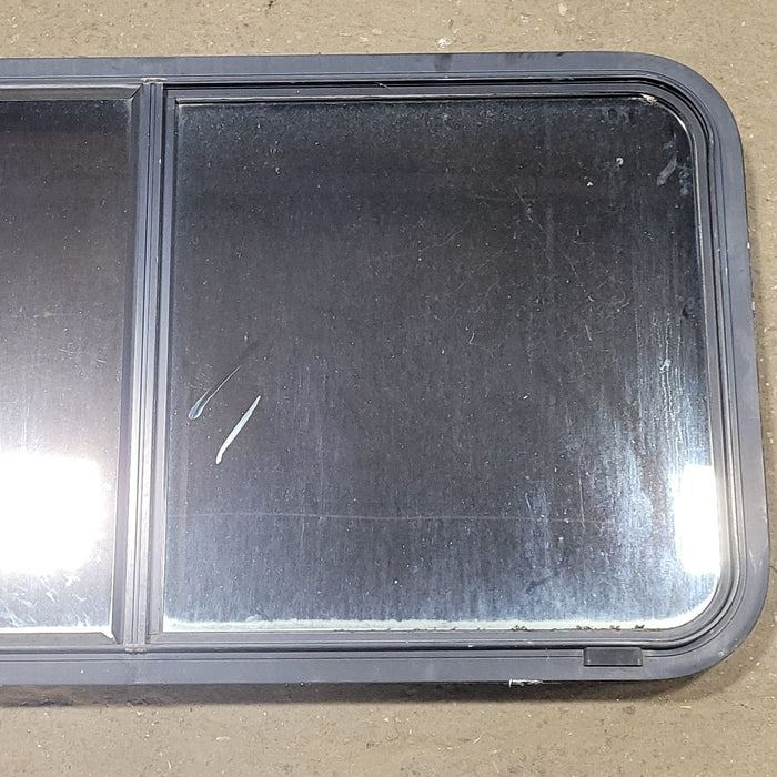 Used Black Radius Opening Window : 42 1/4" W X 22" H X 2" D