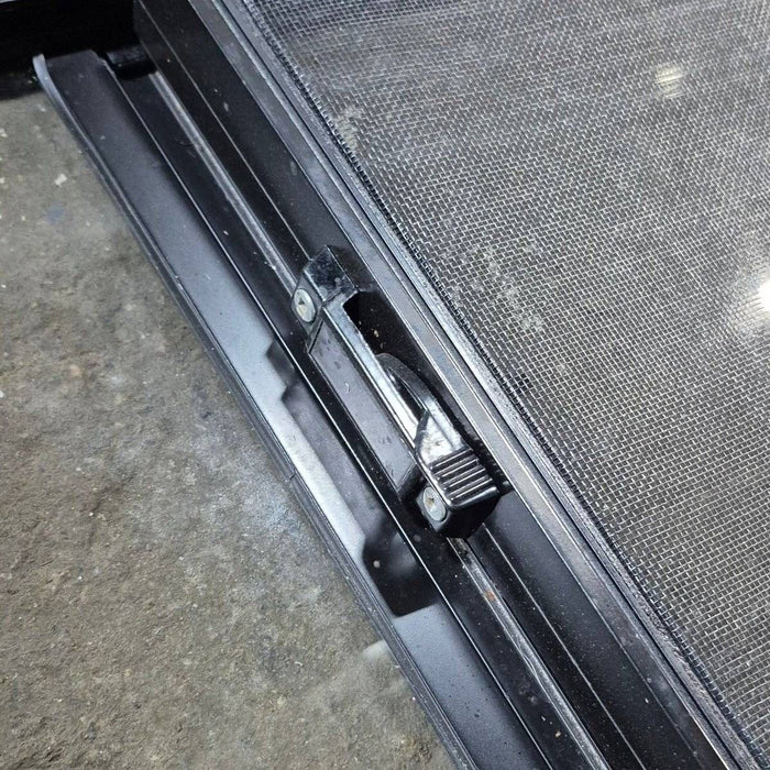 Used Black Radius Opening Window - 42 X 11 3/4 X 2