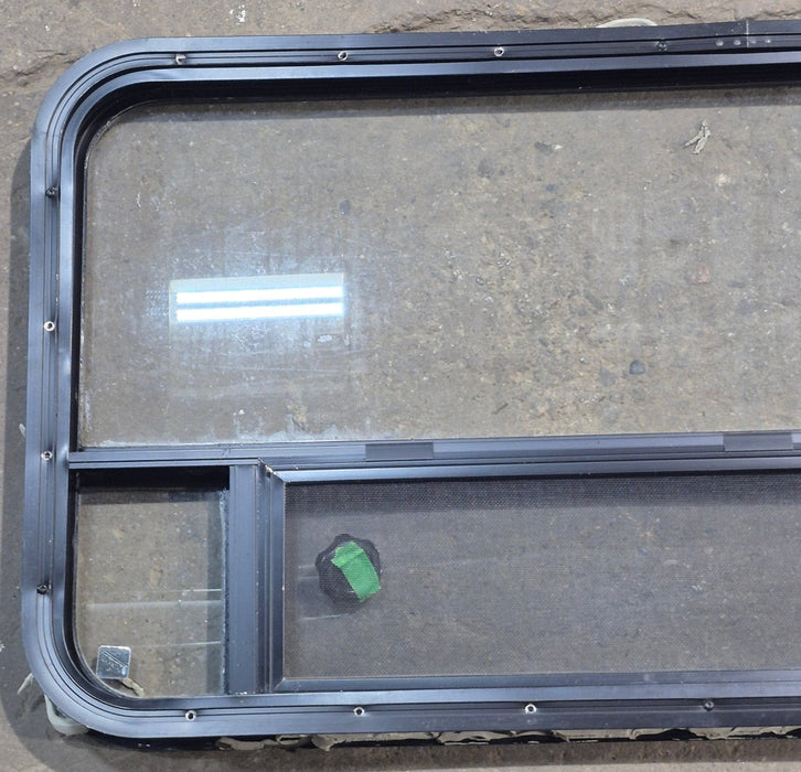 Used Black Radius Opening Window : 45 1/4" W x 21 1/4" H x 1 7/8" D