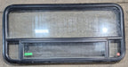 Used Black Radius Opening Window : 45 1/4" W x 21 1/4" H x 1 7/8" D - Young Farts RV Parts