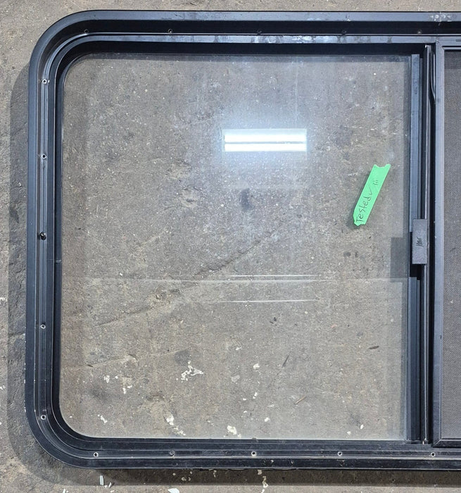 Used Black Radius Opening Window : 45 1/4" W x 25 1/4" H x 1 7/8" D