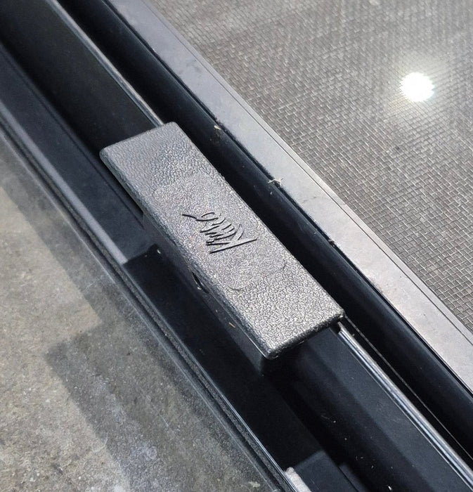 Used Black Radius Opening Window : 45 1/4" W x 25 1/4" H x 1 7/8" D