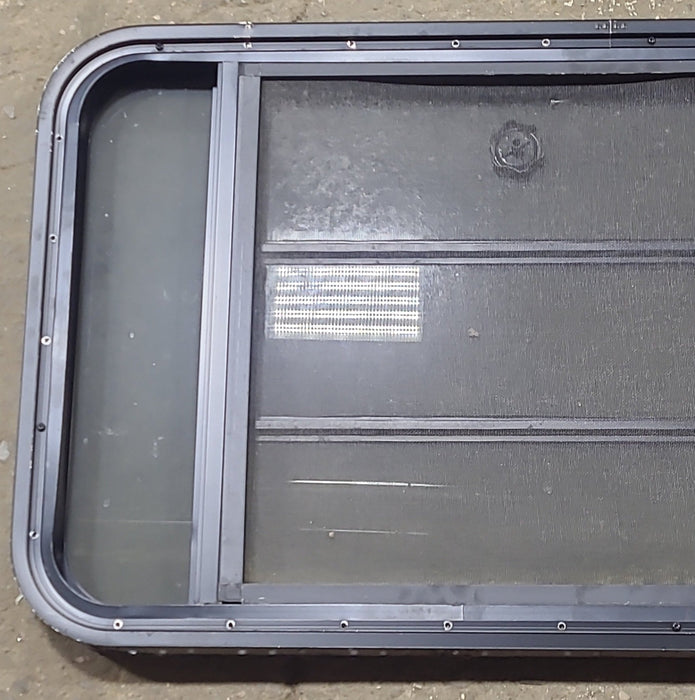 Used Black Radius Opening Window : 45 3/8" W x 22 1/2" H x 1 3/4" D