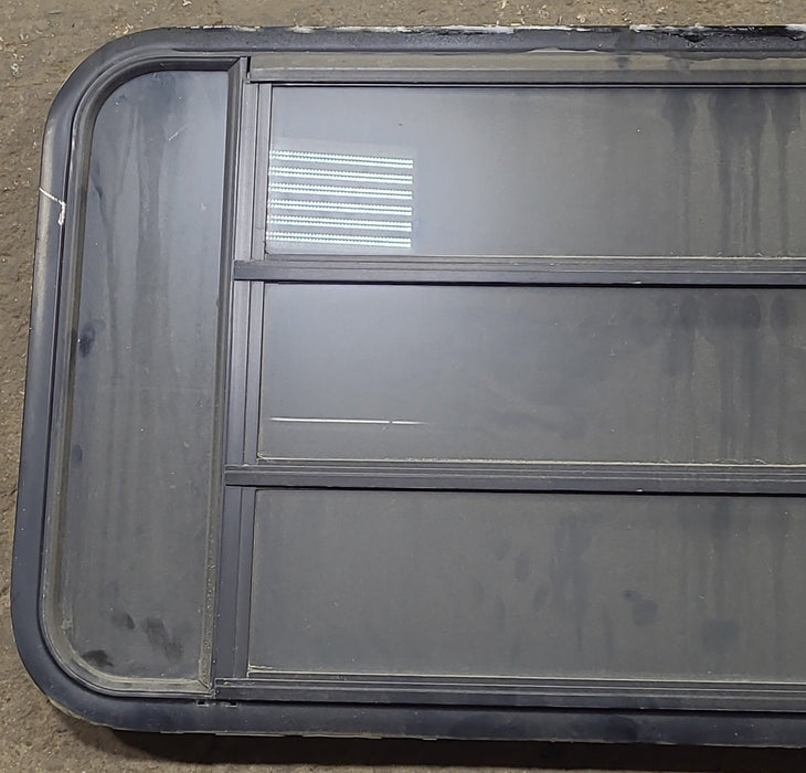 Used Black Radius Opening Window : 45 3/8" W x 22 1/2" H x 1 3/4" D