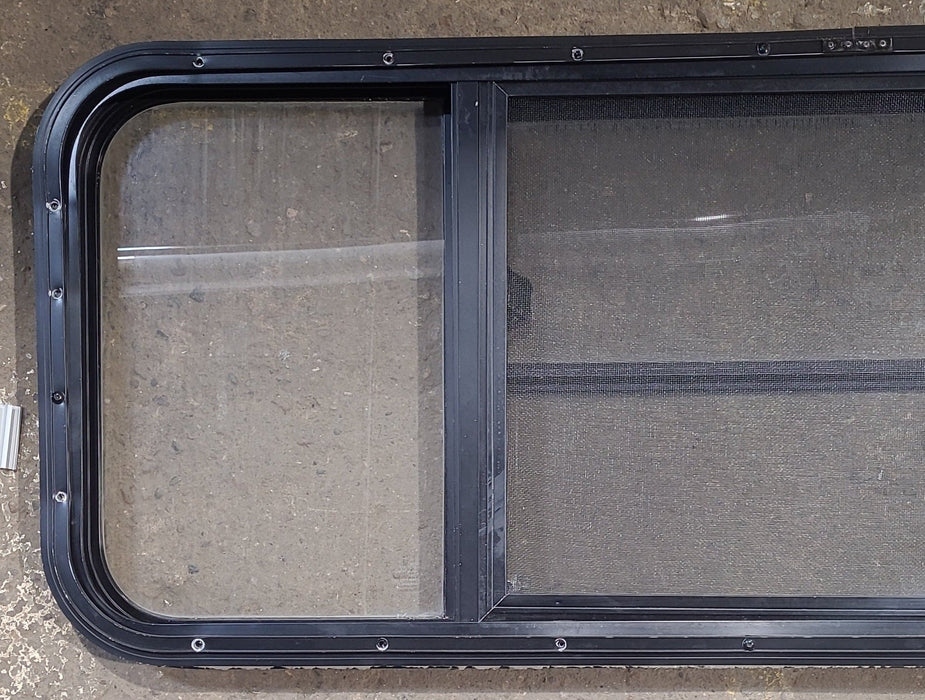 Used Black Radius Opening Window : 47 1/2" W x 17 1/2" H x 1 5/8" D - Young Farts RV Parts