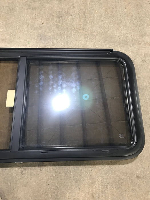 Used Black Radius Opening Window : 47 1/2" W x 21 1/2" H x 1 1/2" D