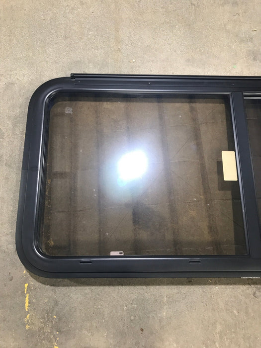 Used Black Radius Opening Window : 47 1/2" W x 21 1/2" H x 1 1/2" D
