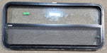 Used Black Radius Opening Window : 47 1/2" W x 21 1/4" H x 1 1/4" D - Young Farts RV Parts