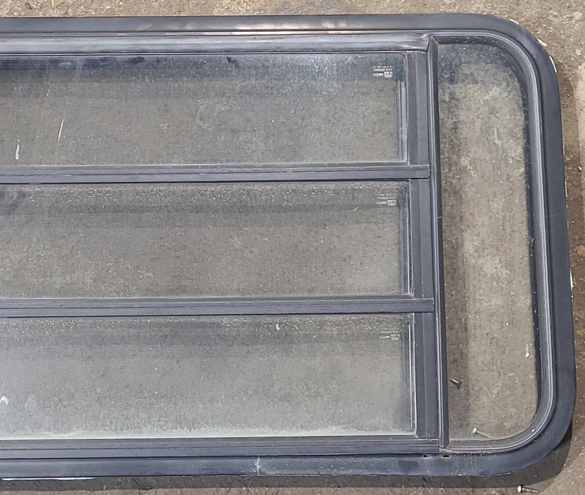 Used Black Radius Opening Window : 47 1/2" W x 22 1/4" H x 1 7/8" D
