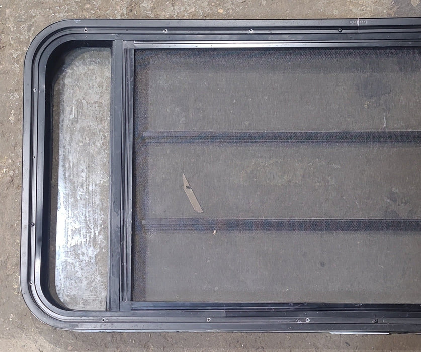 Used Black Radius Opening Window : 47 1/2" W x 22 1/4" H x 1 7/8" D