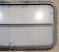 Used Black Radius Opening Window : 47 1/4" W x 21 1/4" H x 1 7/8" - Young Farts RV Parts
