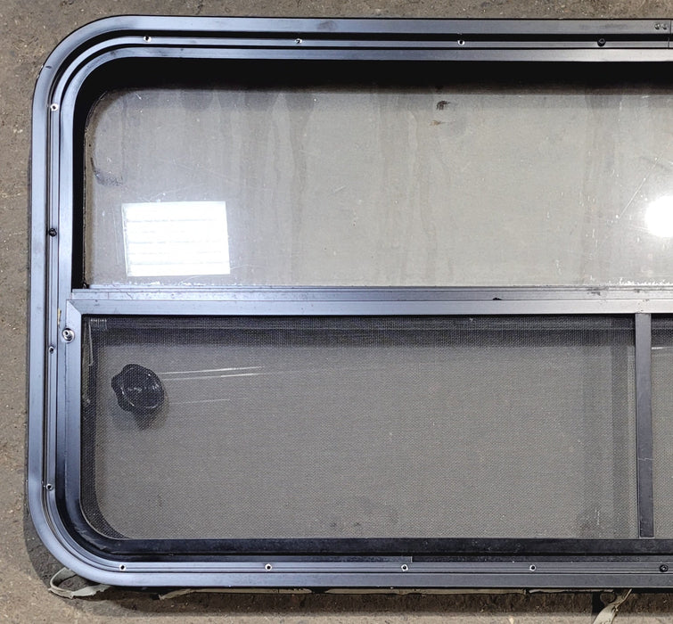 Used Black Radius Opening Window : 47 1/4" W x 21 1/4" H x 1 7/8"