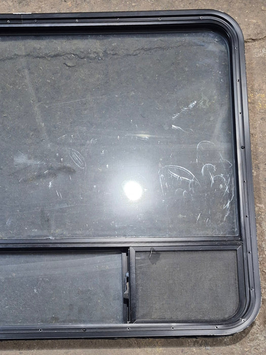 Used Black Radius Opening Window : 47 1/4" W x 34 1/4" H x 1 3/4" D - Young Farts RV Parts