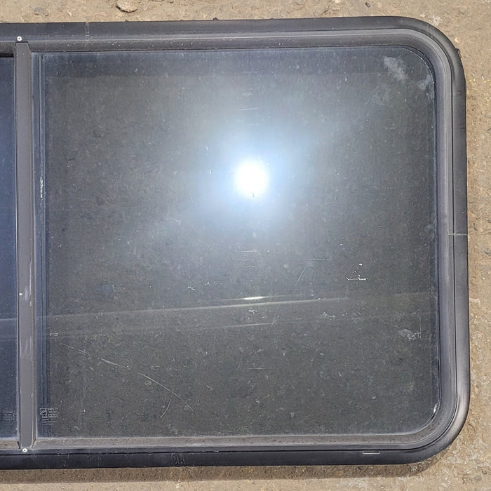 Used Black Radius Opening Window : 47 3/4" W x 23 3/4" H x 1 3/4" - Young Farts RV Parts