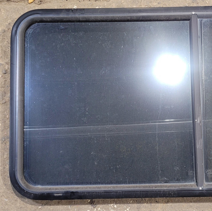 Used Black Radius Opening Window : 47 3/4" W x 23 3/4" H x 1 3/4" - Young Farts RV Parts