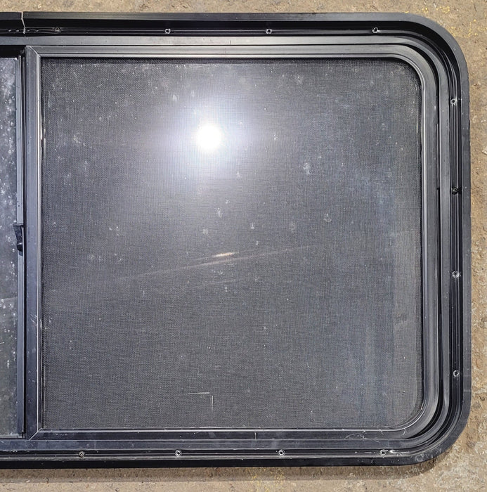 Used Black Radius Opening Window : 47 3/4" W x 23 3/4" H x 1 3/4" - Young Farts RV Parts