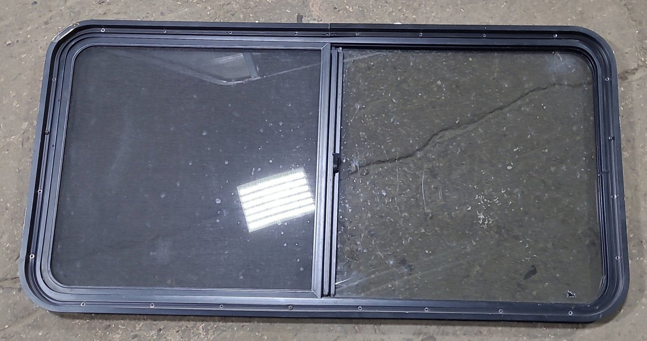 Used Black Radius Opening Window : 47 3/4" W x 23 3/4" H x 1 7/8" D