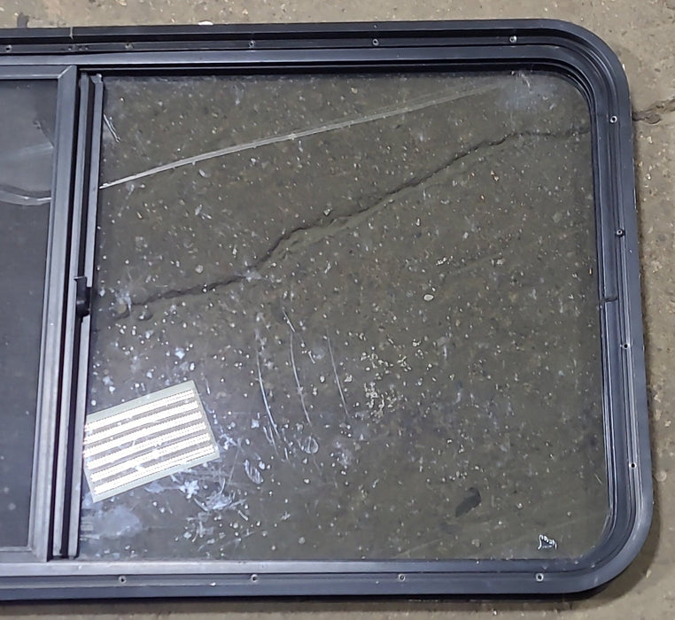 Used Black Radius Opening Window : 47 3/4" W x 23 3/4" H x 1 7/8" D