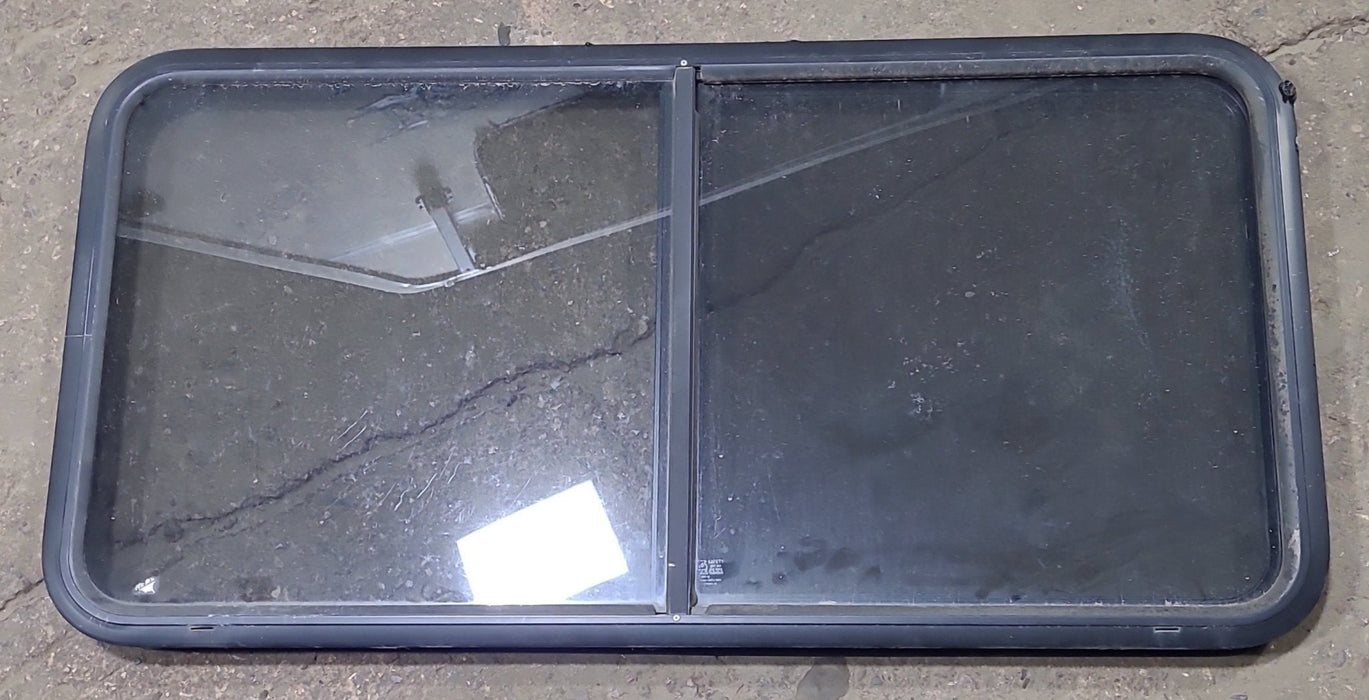 Used Black Radius Opening Window : 47 3/4" W x 23 3/4" H x 1 7/8" D