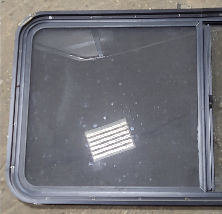 Used Black Radius Opening Window : 47 3/4" W x 23 3/4" H x 1 7/8" D