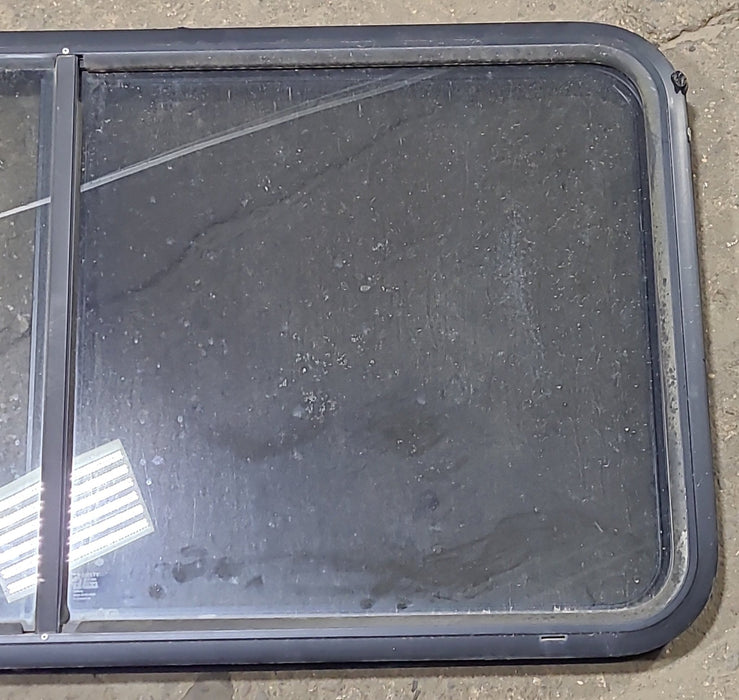 Used Black Radius Opening Window : 47 3/4" W x 23 3/4" H x 1 7/8" D