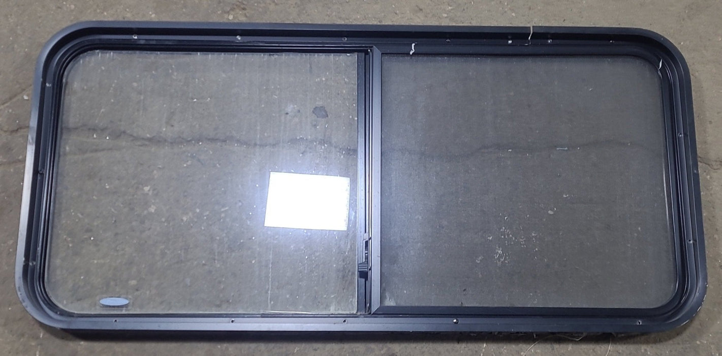 Used Black Radius Opening Window : 47 3/8" W x 21 3/4" H x 1 7/8" D - Young Farts RV Parts