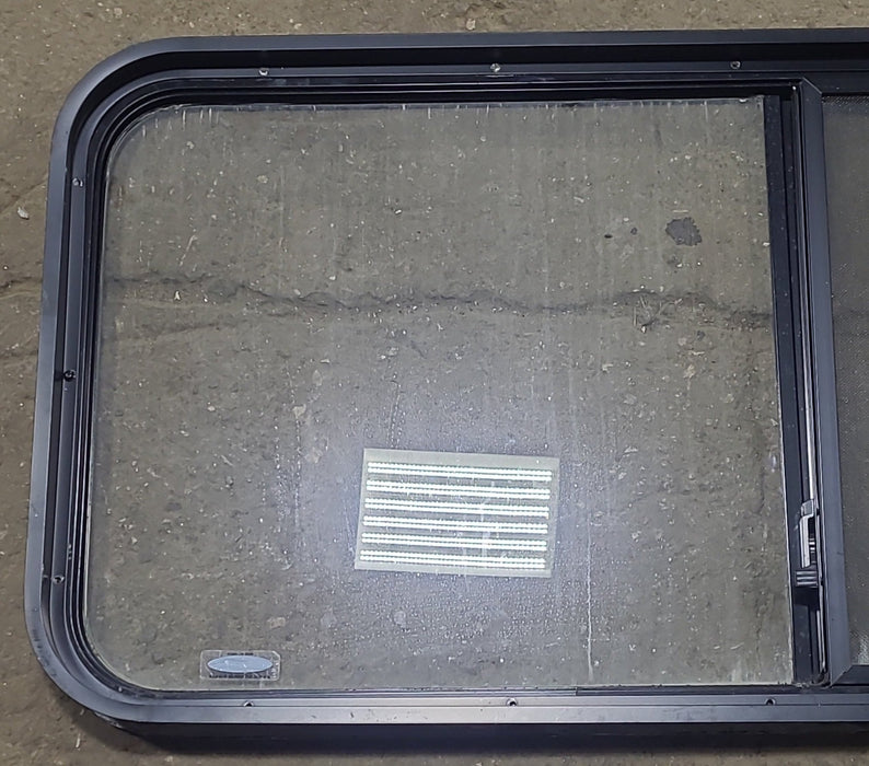 Used Black Radius Opening Window : 47 3/8" W x 21 3/4" H x 1 7/8" D