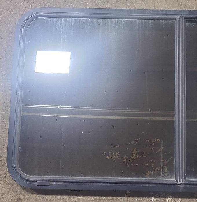 Used Black Radius Opening Window : 48 1/2" W x 26 1/4" H x 1 3/4" D