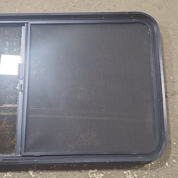 Used Black Radius Opening Window : 48 1/2" W x 26 1/4" H x 1 3/4" D