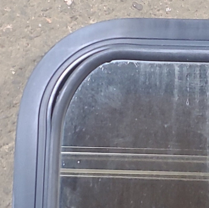 Used Black Radius Opening Window : 48 1/2" W x 26 1/4" H x 1 3/4" D