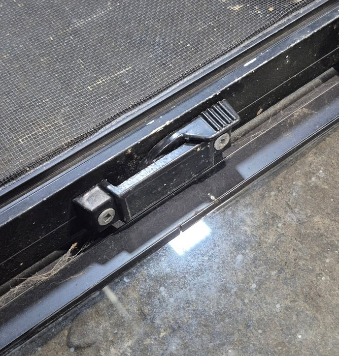 Used Black Radius Opening Window : 48 1/4" W x 31 3/4" H x 1 7/8" - Young Farts RV Parts