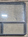 Used Black Radius Opening Window : 48 1/4" W x 35 3/4" H x 1 5/8" D - Young Farts RV Parts