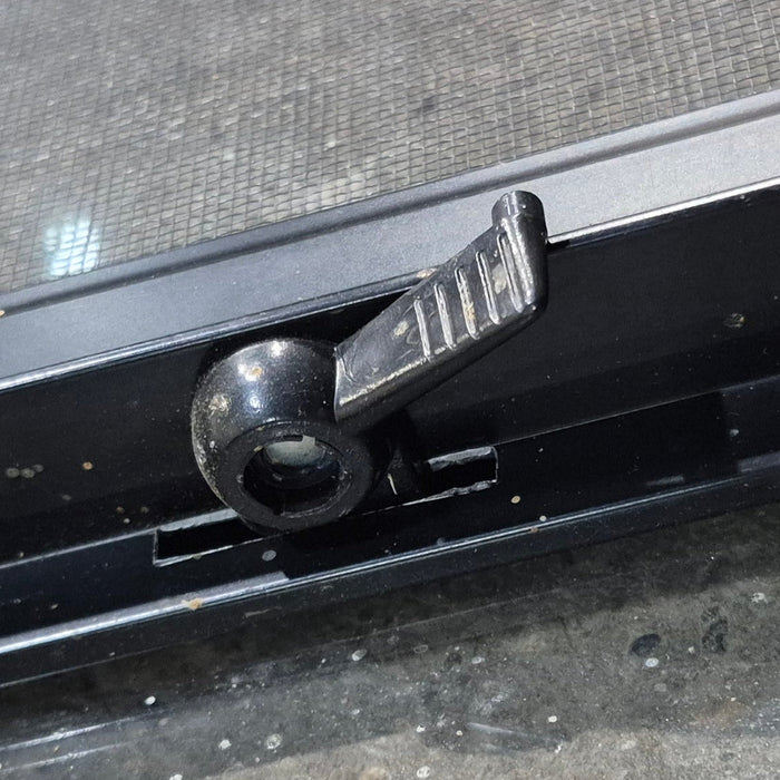 Used Black Radius Opening Window : 48 1/4" W x 35 3/4" H x 1 5/8" D - Young Farts RV Parts
