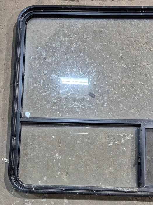 Used Black Radius Opening Window : 48 1/4" W x 35 3/4" H x 1 5/8" D - Young Farts RV Parts