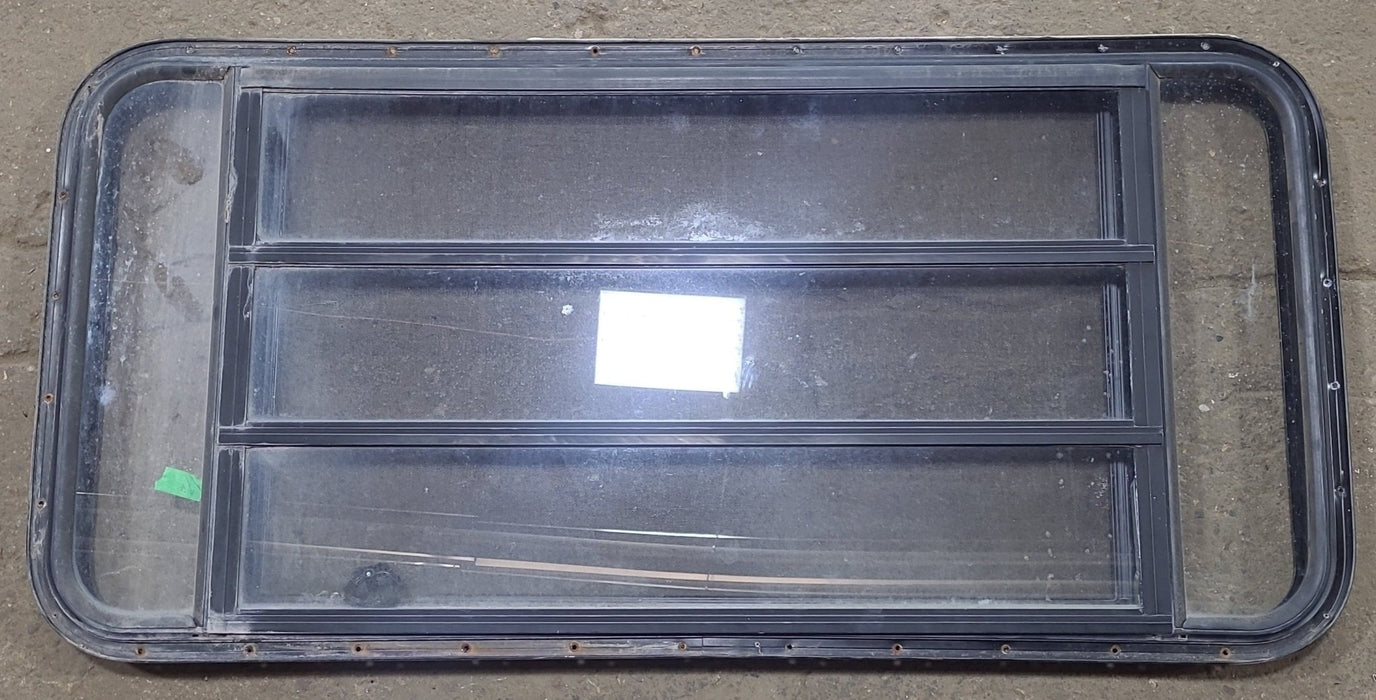 Used Black Radius Opening Window : 48 3/4" W x 23 1/2" H x 1 5/8" D