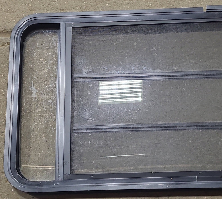 Used Black Radius Opening Window : 48 3/4" W x 23 1/2" H x 1 5/8" D