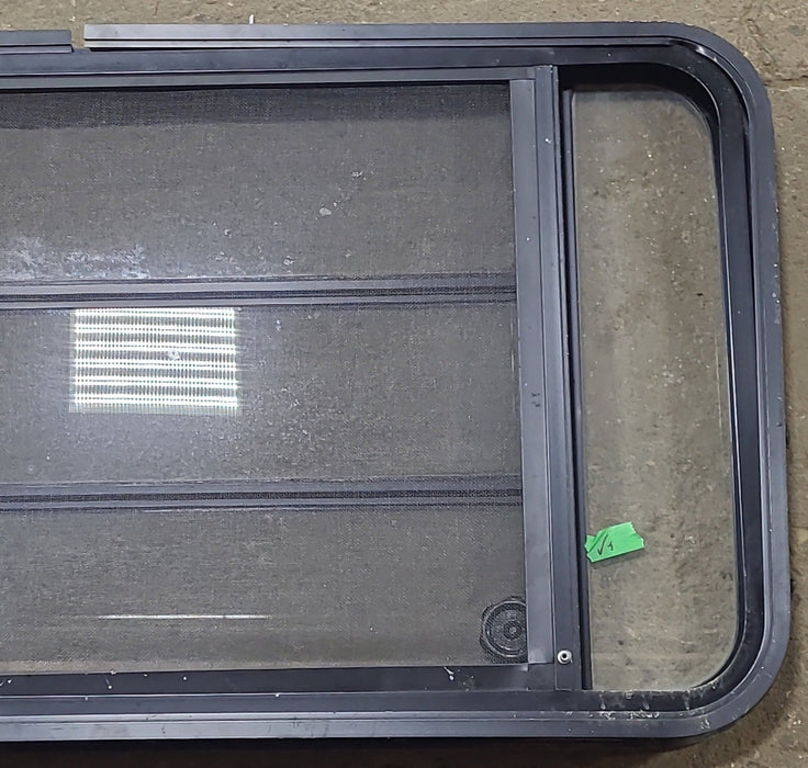 Used Black Radius Opening Window : 48 3/4" W x 23 1/2" H x 1 5/8" D