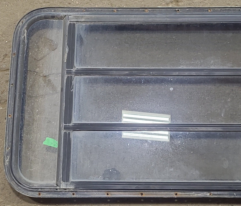 Used Black Radius Opening Window : 48 3/4" W x 23 1/2" H x 1 5/8" D