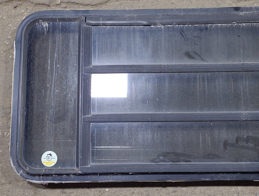 Used Black Radius Opening Window : 53" W x 21" H x 1 3/4" D - Young Farts RV Parts