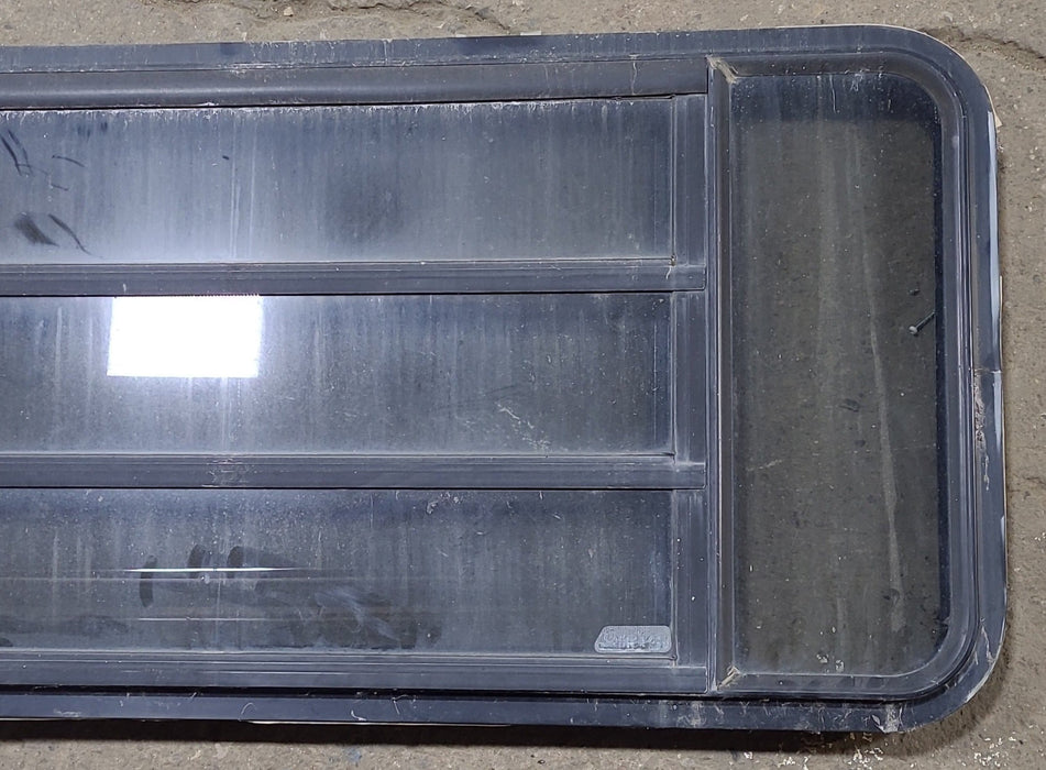 Used Black Radius Opening Window : 53" W x 21" H x 1 3/4" D - Young Farts RV Parts