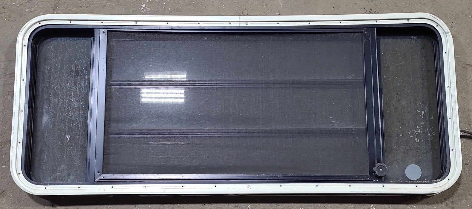 Used Black Radius Opening Window : 53" W x 21" H x 1 3/4" D - Young Farts RV Parts