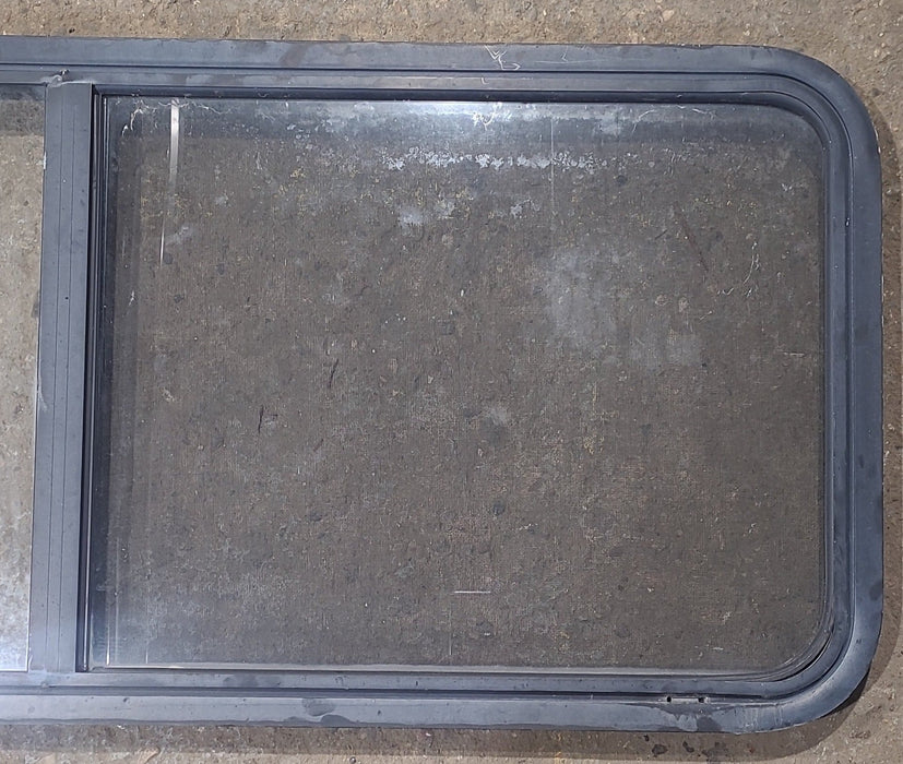 Used Black Radius Opening Window : 54 1/4" W x 21 3/4" H x 1 7/8" D