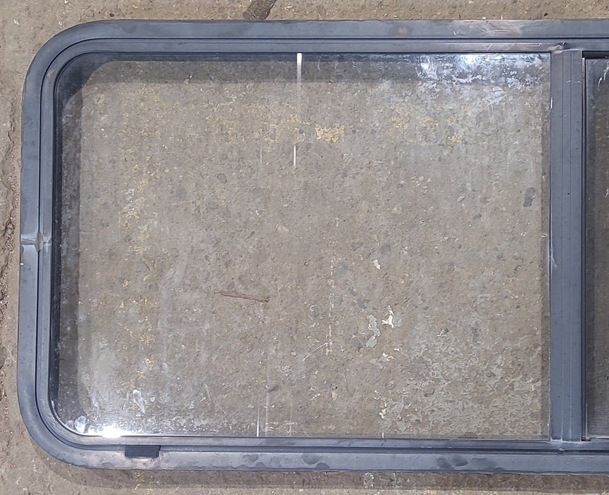 Used Black Radius Opening Window : 54 1/4" W x 21 3/4" H x 1 7/8" D