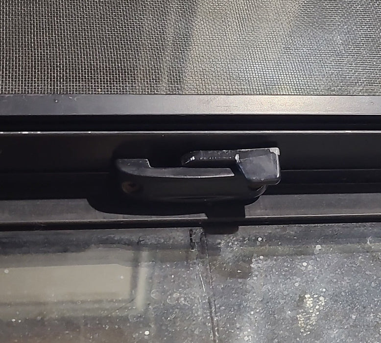Used Black Radius Opening Window : 54" W x 17 1/2" H x 2" D - Young Farts RV Parts