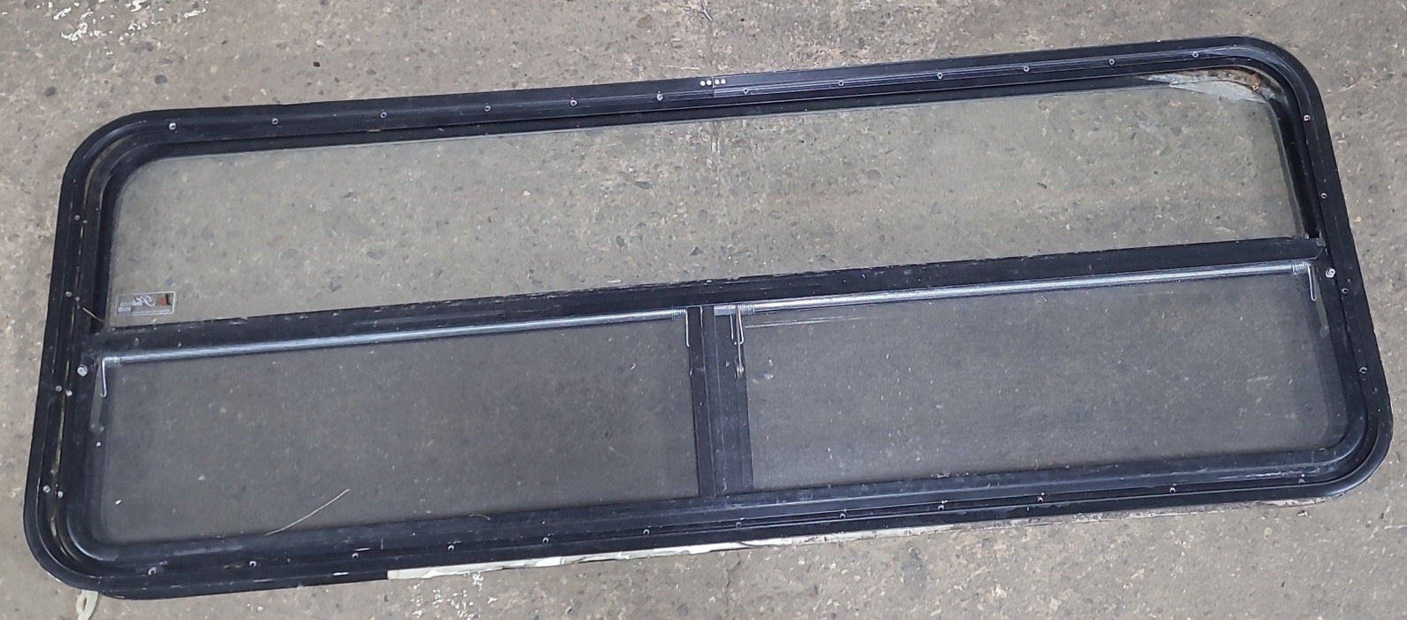 Used Black Radius Opening Window : 59 1/2" W x 21 1/4" H x 1 1/2" D